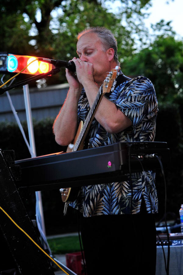 Peter Morgan blowing the  rarmonica